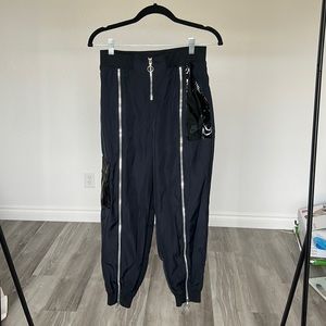 Nike black sweats with patent pockets